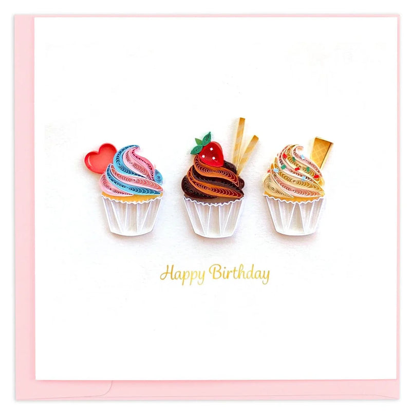 Quilled birthday card with three cupcakes topped in colorful frosting, candy decor, and gold “Happy Birthday” script—fun and festive.