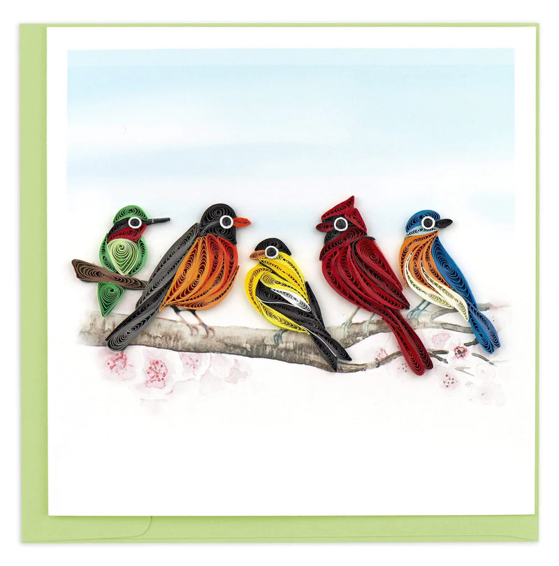 Quilled card with five colorful birds, including a cardinal and hummingbird, perched on a branch—symbolizing joy, unity, and nature&