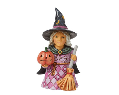 Jim Shore Mini Witch Holding Pumpkin figurine, wearing a purple patterned gown, holding a broomstick and jack-o-lantern.