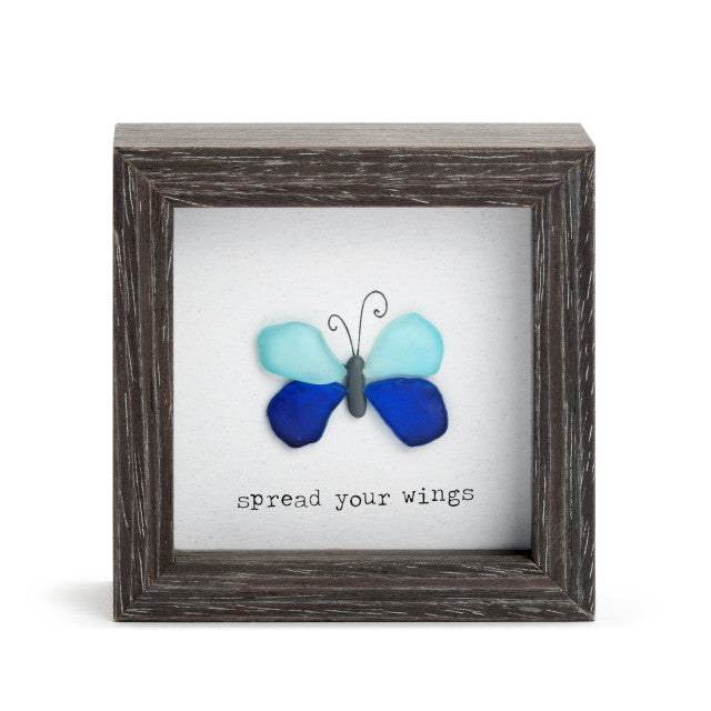 Decorative wooden shadow box with butterfly artwork and Spread Your Wings  message, designed for tabletop or wall display.


