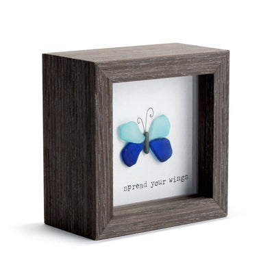 Decorative wooden shadow box with butterfly artwork and  Spread Your Wings  message, designed for tabletop or wall display.

