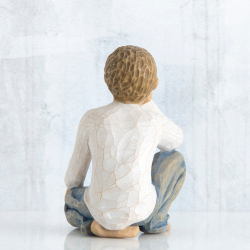 Willow Tree Inquisitive Child figurine kneeling with hand under chin.
