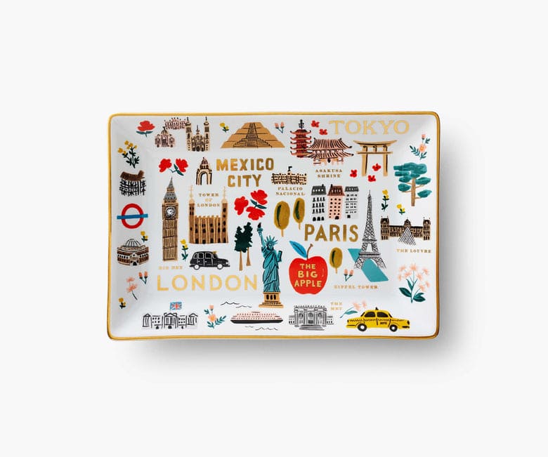Rifle Paper Co. Bon Voyage porcelain tray featuring colorful travel icons and gold foil accents, ideal for jewelry or keys.