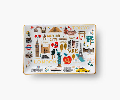 Rifle Paper Co. Bon Voyage porcelain tray featuring colorful travel icons and gold foil accents, ideal for jewelry or keys.