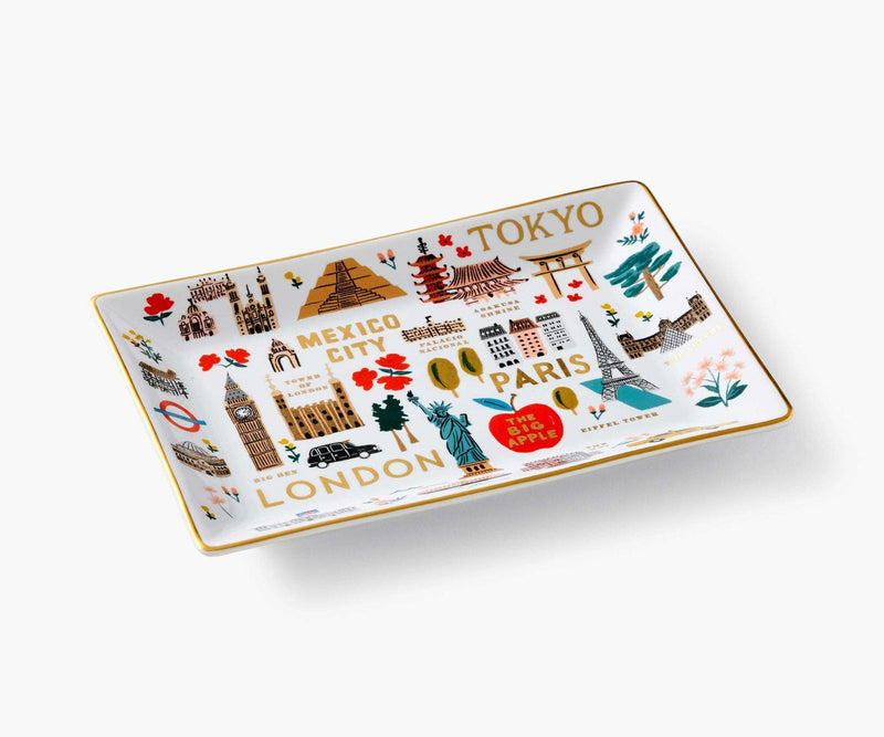 Rifle Paper Co. Bon Voyage porcelain tray featuring colorful travel icons and gold foil accents, ideal for jewelry or keys.