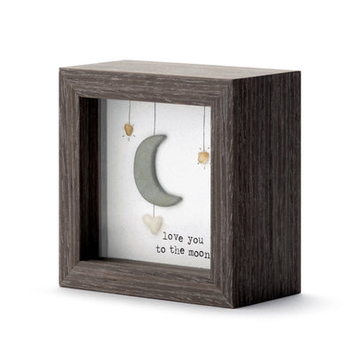 Love You to the Moon shadow box with pebble art by Sharon Nowlan, showcasing heartfelt coastal Nova Scotia-inspired design.

