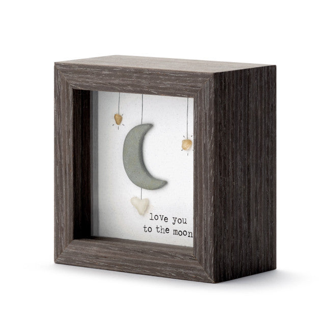 Love You to the Moon shadow box with pebble art by Sharon Nowlan, showcasing heartfelt coastal Nova Scotia-inspired design.

