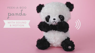 Soft plush panda toy sitting upright with its paws raised, designed to play peek-a-boo and speak phrases when activated