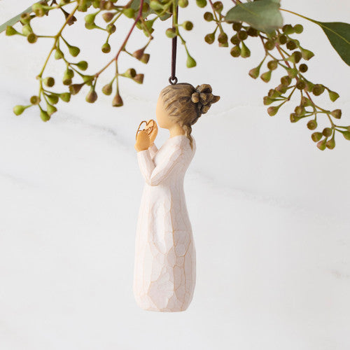 Willow Tree 2025 Ornament figurine in cream dress holding a golden wire heart with 2025 inside, hanging by a brown cord.