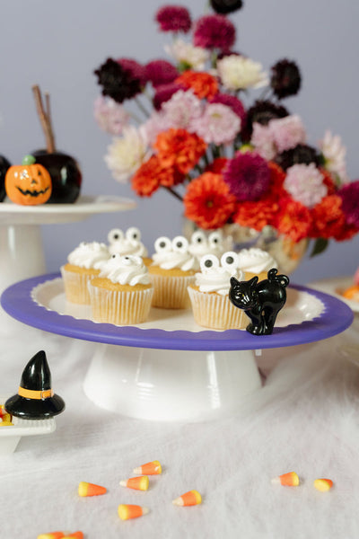 Nora Fleming black cat mini with upright tail and curious expression; perfect for Halloween or everyday decor;  