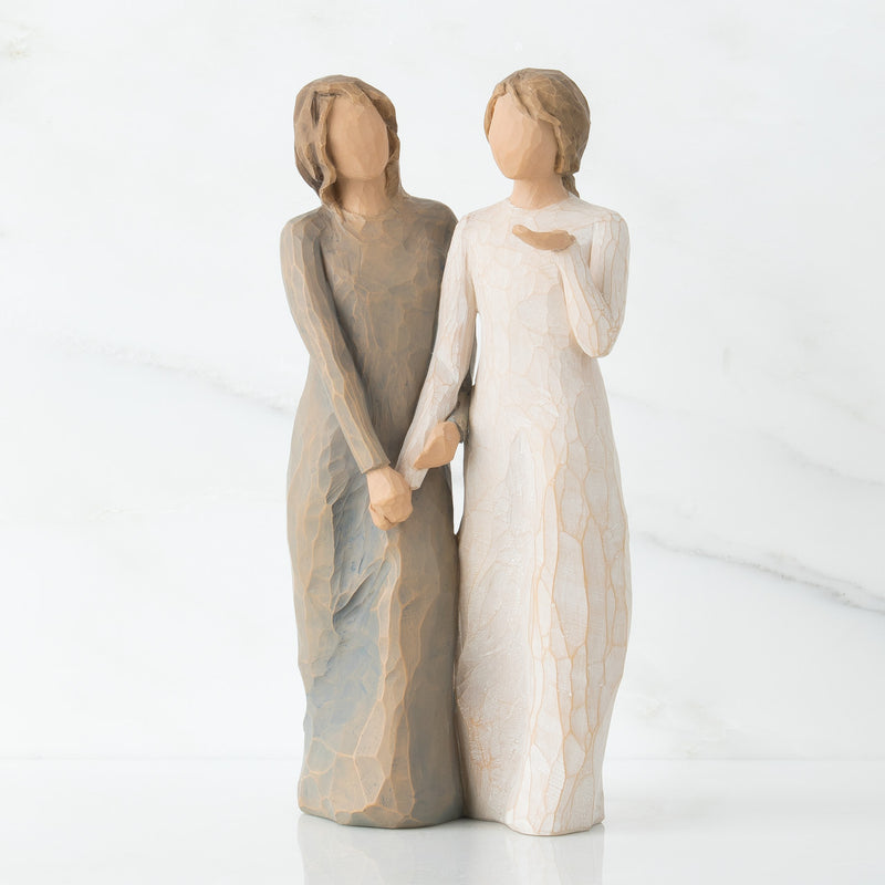 Willow Tree figurine of two women standing side by side with arms connected.