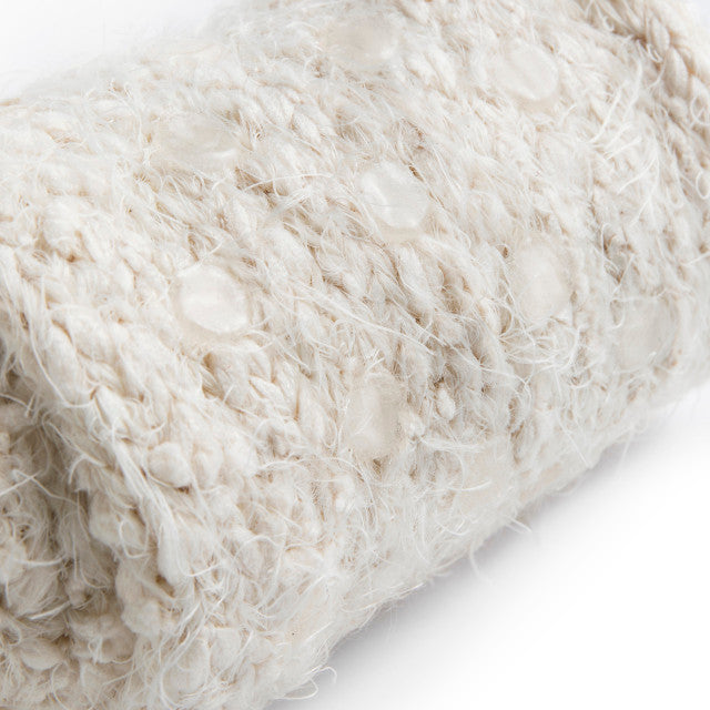 Cream fuzzy women’s socks with rubber grippers on the soles, ultra-soft and cozy, part of the Demdaco Giving Collection.