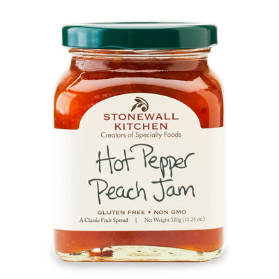 Hot Pepper Peach Jam has juicy peaches and added hot peppery spices to create a mellow jam that ends in a bite of spice.