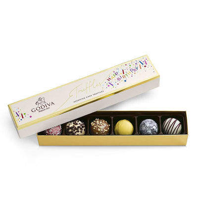 Filled with six luscious truffle flavors that were inspired by birthday chocolate