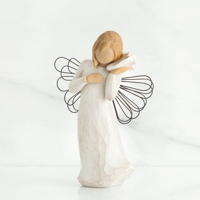 Thinking of You, Willow Tree, Standing angel in a cream dress with wire wings, holding a pink conch shell to the ear.