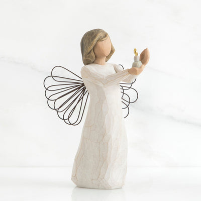Angel of Hope: Willow Tree with A standing angel in a cream dress with wire wings holds a small gold-flamed candle in her hands.