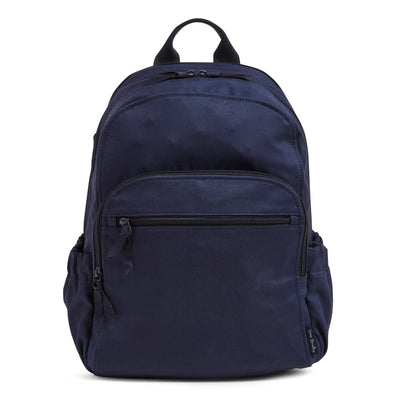 Exterior features include two side slip pockets and a hidden back zip pocket.