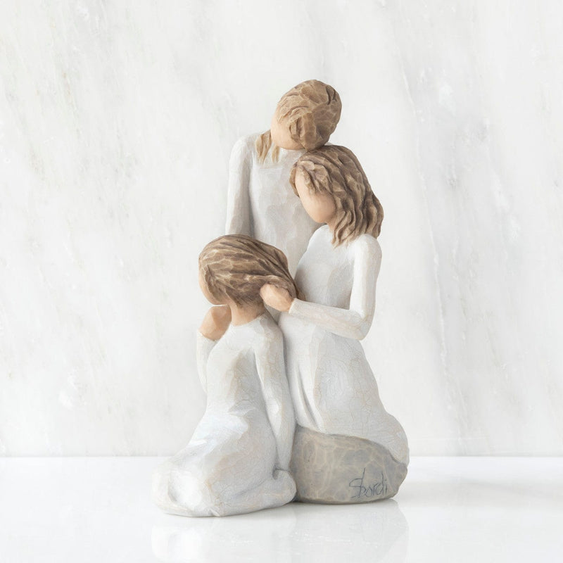 Our Healing Touch: Willow Tree, with a figure of three women in a cream dress and brown hair, represents