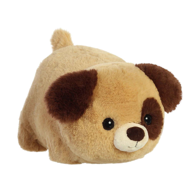 Brown and white stuffed dog with floppy ears and a brown nose.