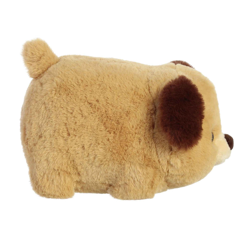 Brown and white stuffed dog with floppy ears and a brown nose.