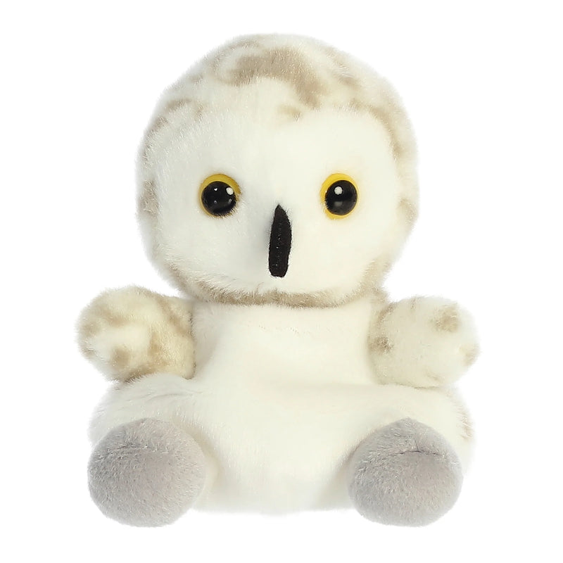  and white plush sheep with black embroidered eyes and a stitched smile.