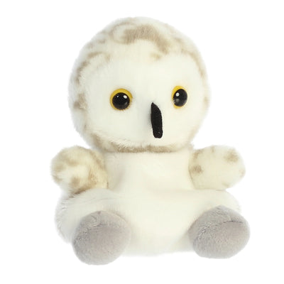  and white plush sheep with black embroidered eyes and a stitched smile.