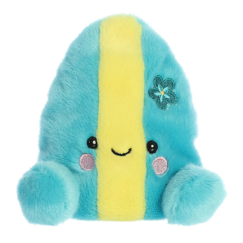 Light blue plush narwhal with a white belly, black eyes, and a spiraling horn