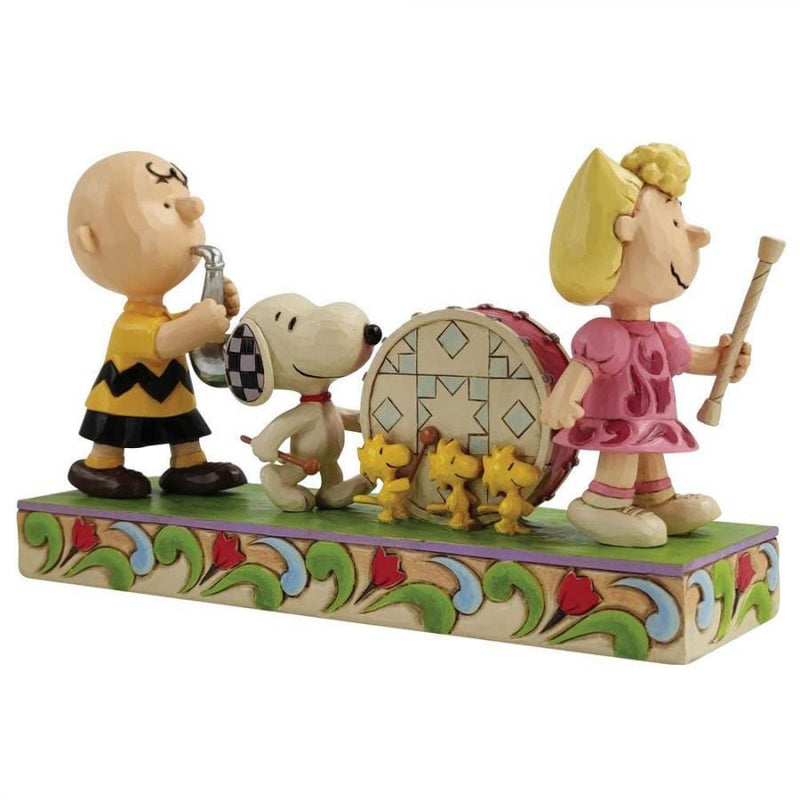 Enesco Peanuts by Jim Shore Peanuts Parade Figurine Hand-crafted from high-quality stone resin material and hand-painted