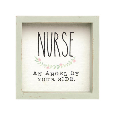 Nurse Framed Sign It features a watercolor stem with little pink flowers, and it has a light sage distressed frame.