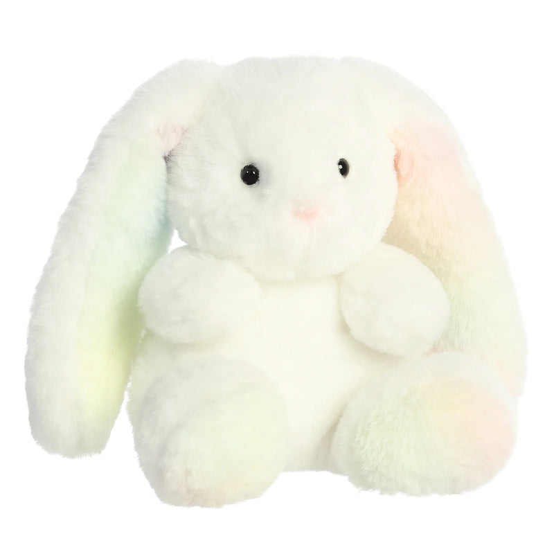 White plush rabbit with rainbow colored ears. 