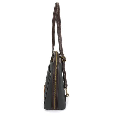 Black leather purse with dragonfly design on flap closure. Detachable crossbody strap.