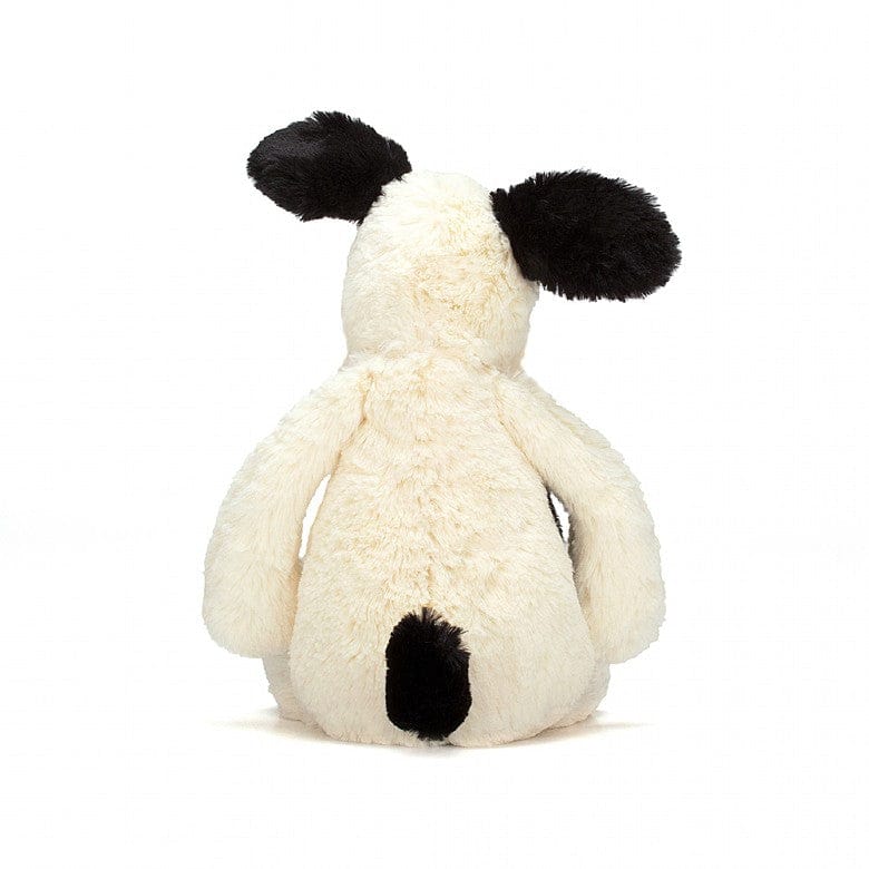 Bashful Black and Cream Puppy soft His smudgy black patch and sooty tail make him even more adorable.