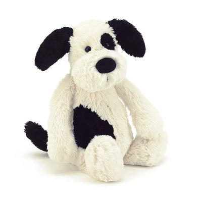 Bashful Black and Cream Puppy soft His smudgy black patch and sooty tail make him even more adorable.