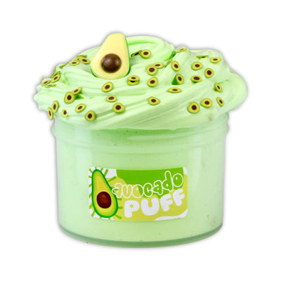 Container of Avocado Puff slime by Dope Slimes. Light green, butter slime with a lid topped with miniature avocado slices made of polymer clay. Text on container reads “Quocado PUFF