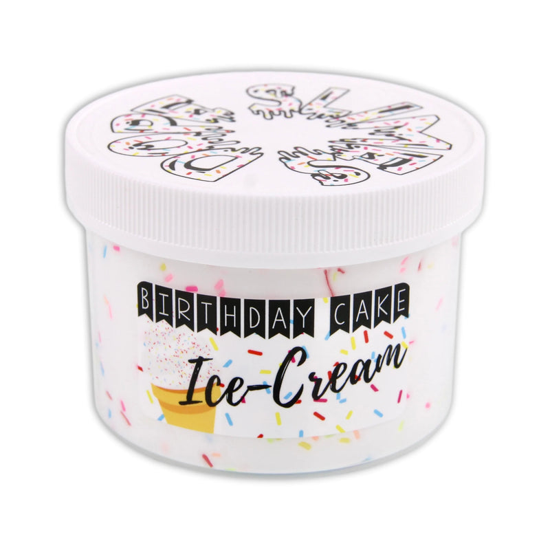 Ice cream cup with vanilla and chocolate ice cream topped with whipped cream, sprinkles, and a cherry. Text on cup reads “Ice-Cream