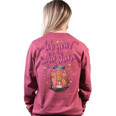 Light Shine Long Sleeve with fireflies in a mason jar with a candle inside