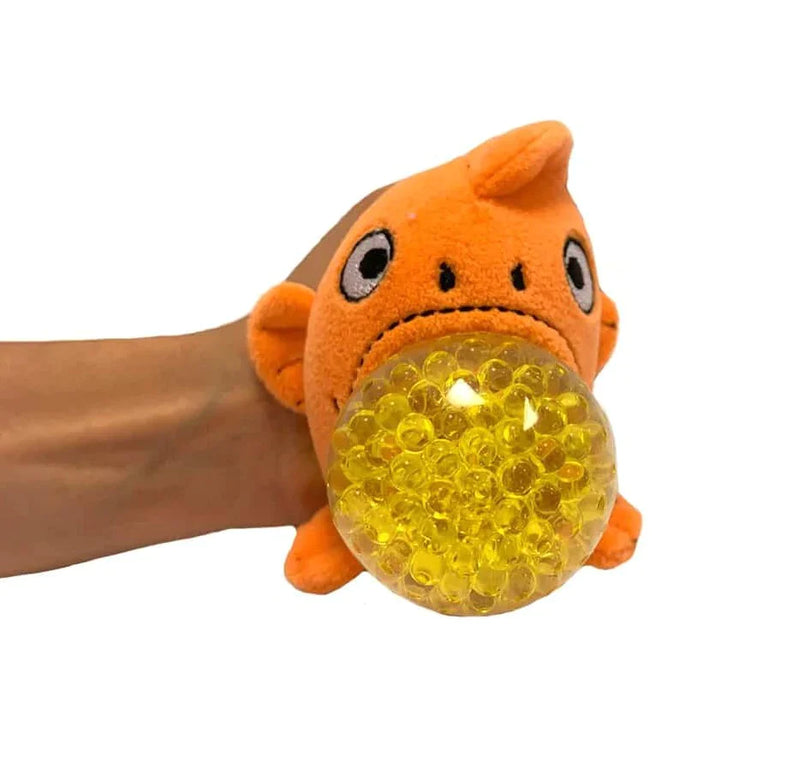 A flexible orange fish with a squeezable gel bead inside
