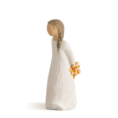 For You – Willow Tree with in a cream dress, holding a small bouquet of orange flowers behind her back