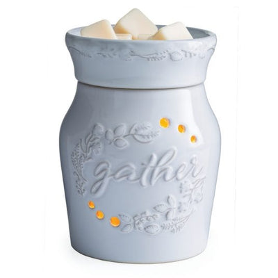 Gather Illumination Fragrance warmers designed to warm scented wax and create the ambient glow of a burning candle.