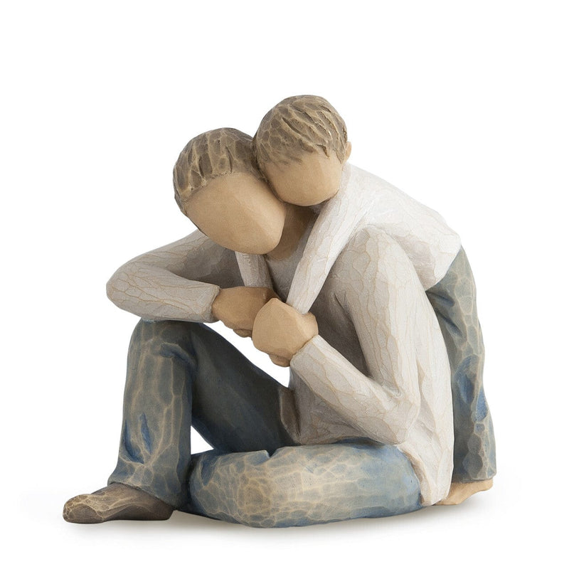 Willow Tree line of sculptures created by Susan Lordi. It depicts a father and son embracing