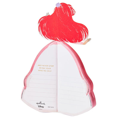 A pop-up greeting card features an intricate laser-cut design of Disney Princess Ariel from