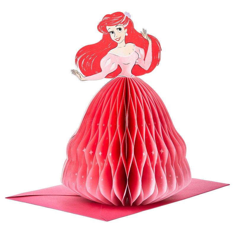 A pop-up greeting card features an intricate laser-cut design of Disney Princess Ariel from