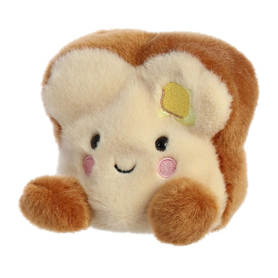 Stuffed toy shaped like a slice of bread with butter on top