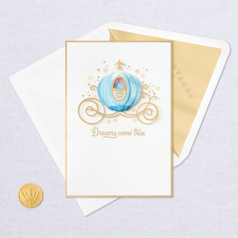 Blank greeting card features a layered, dimensional attachment of Cinderella&