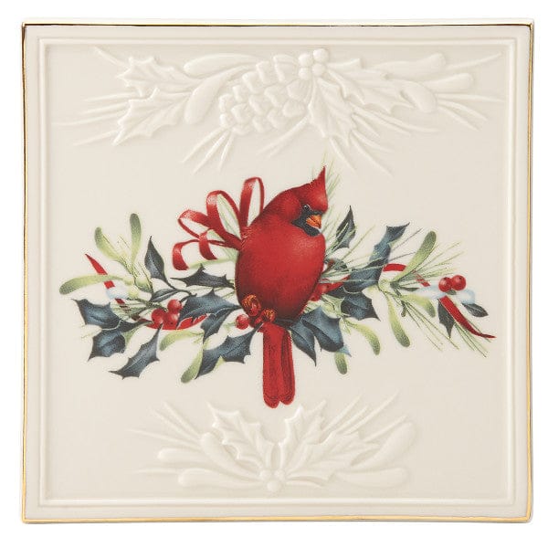 Winter Greetings™ Trivet with a cardinal perched on a twig and decorated with a bright red ribbon