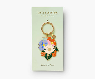 featuring a glossy finish and a Rifle Paper Co. charm.