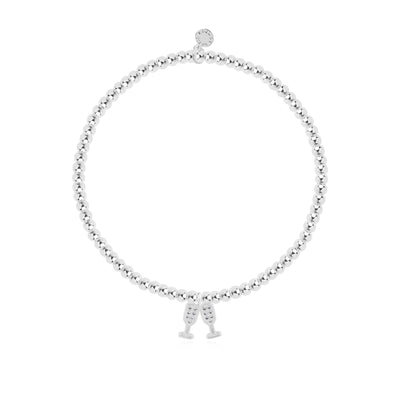 Silver-plated bracelet with champagne flute charms on a 'Birthday Cheers!' message card by Katie Loxton.

