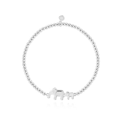 Silver-plated bracelet with heart charm on a card that reads 'family is everything now and forever'.

