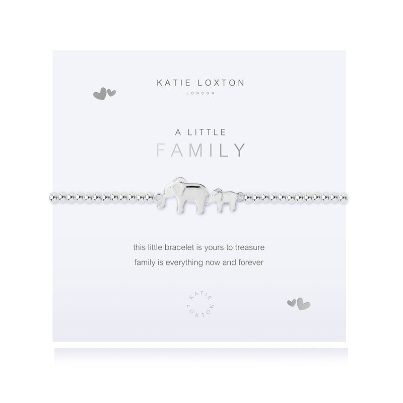 Silver-plated bracelet with heart charm on a card that reads &