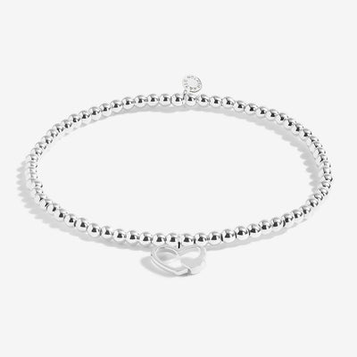 Boxed bracelet with gold-embossed 'Happy Mother's Day' sentiment and silver charm inside.

